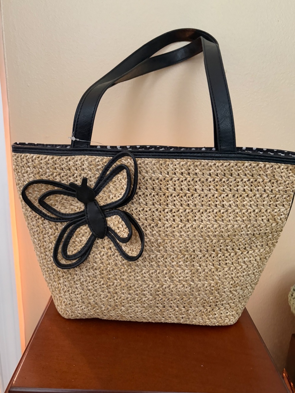 Neutral Straw Tote with Black Trim and Butterfly Accent